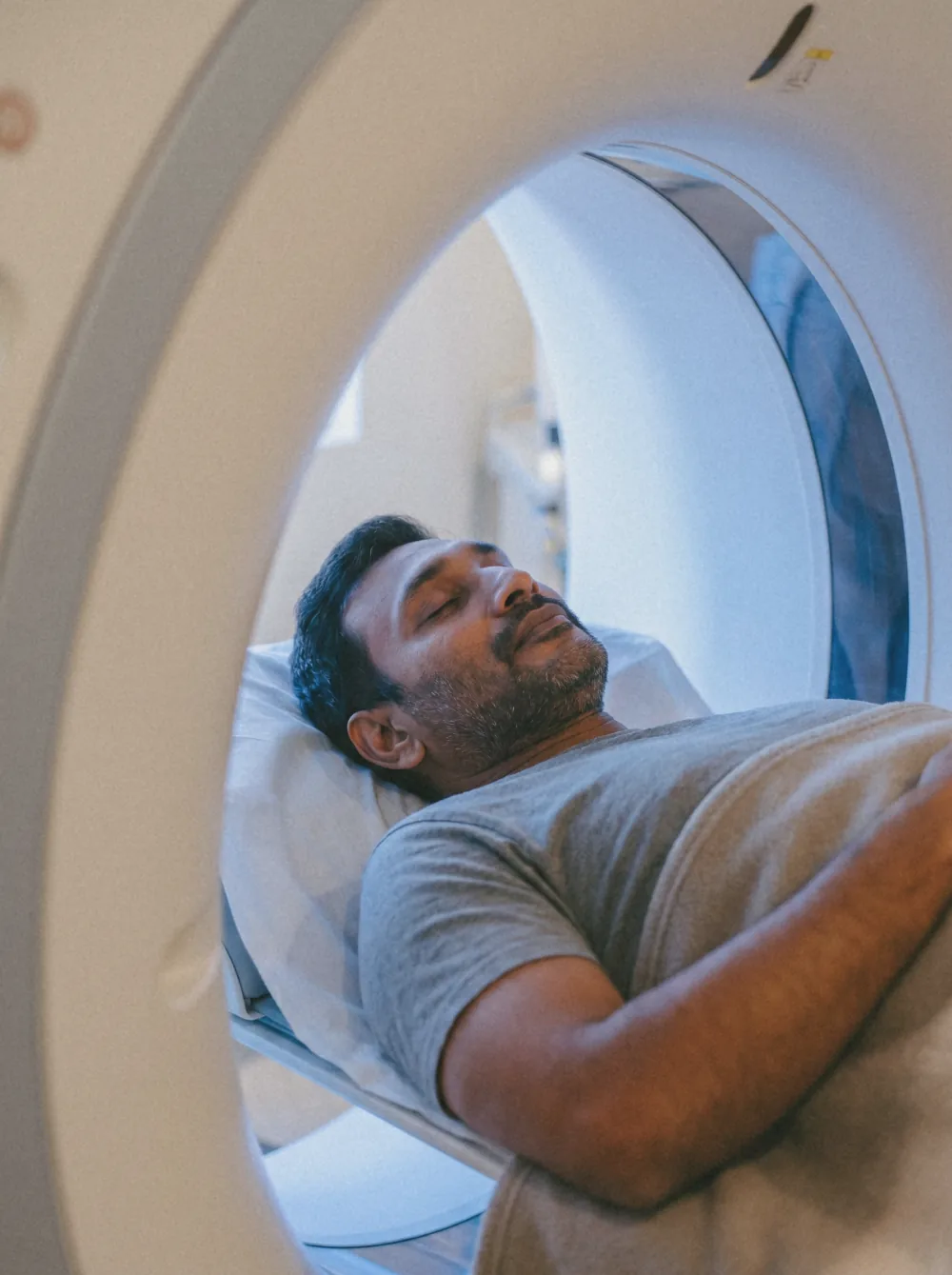 Person receiving a coronary calcium CT scan